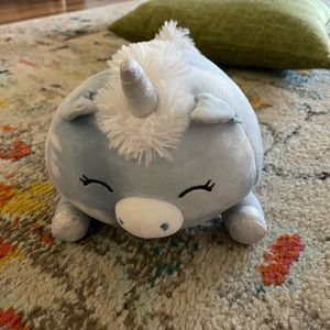 Delva laying hugmees squishmallow